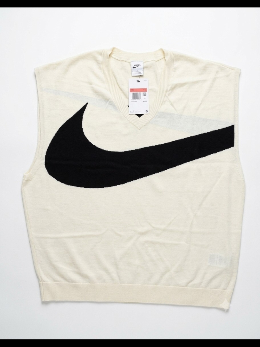 Nike Men’s Cream V-Neck Sweater Vest with Black Swoosh